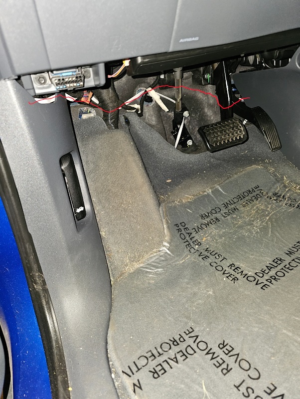 Image of cable route under dashboard